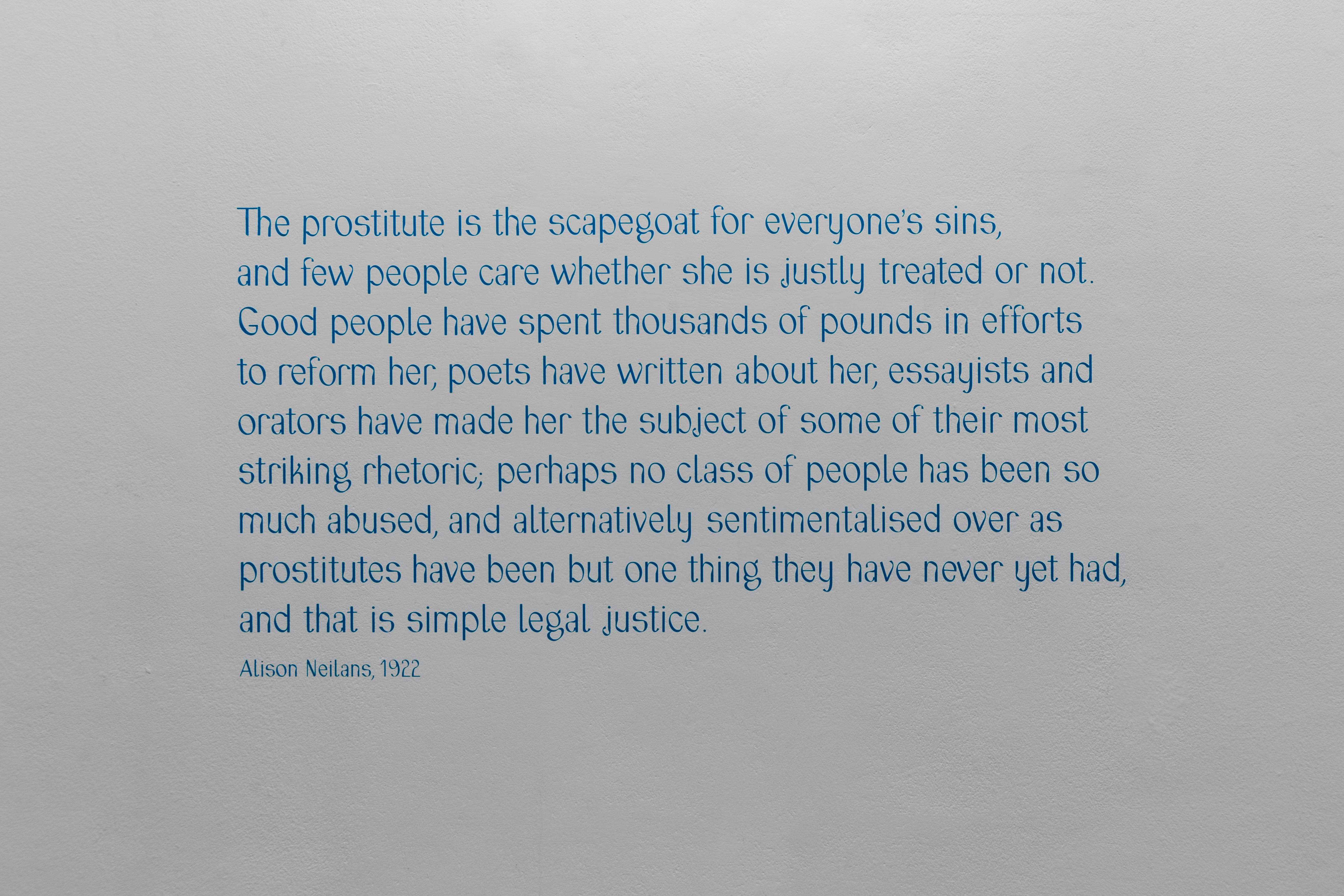 A wall with the text printed on it which reads: 
